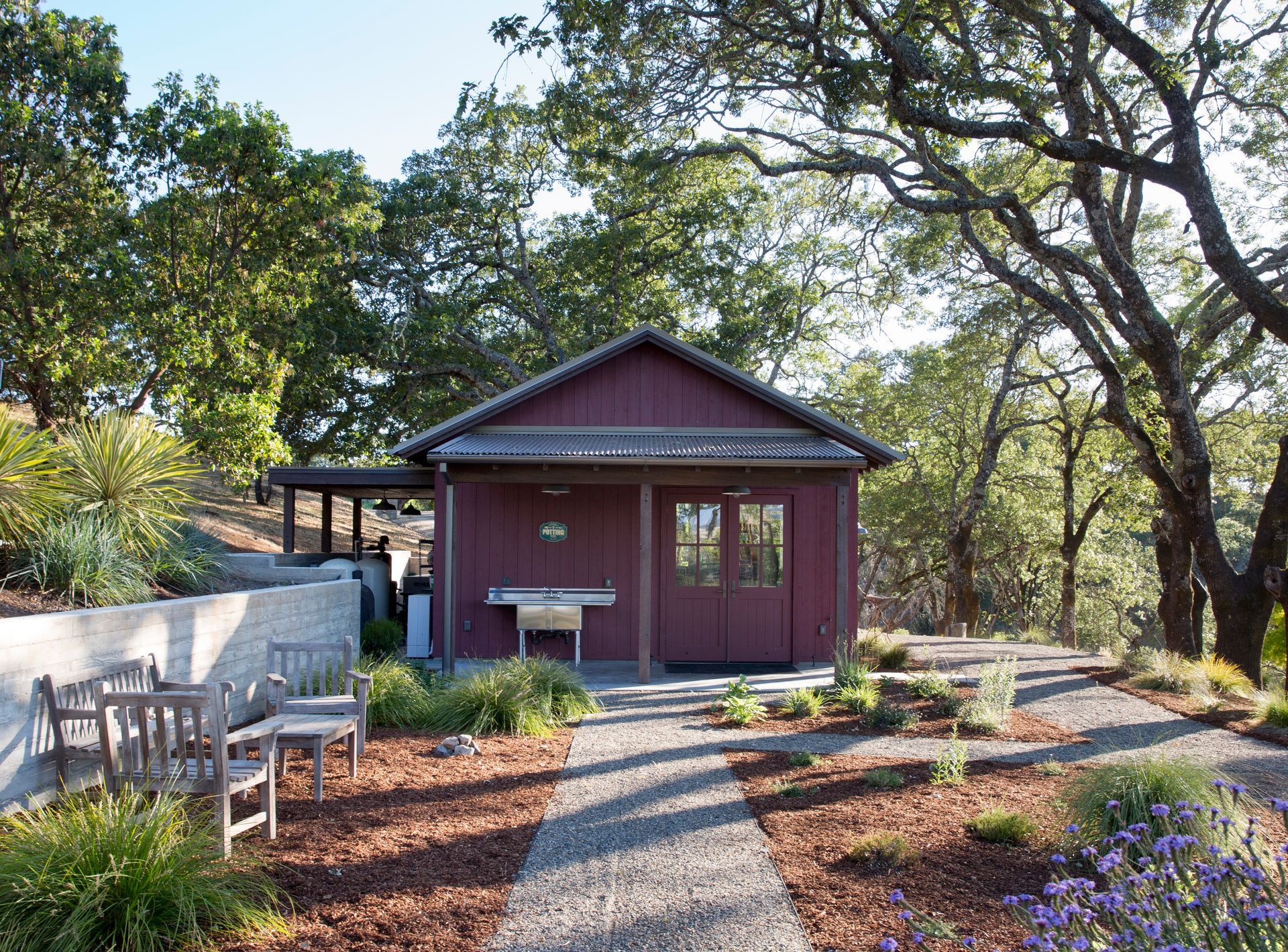 Red shed with a pathway built by Nunley Custom Homes in Greenville, SC.