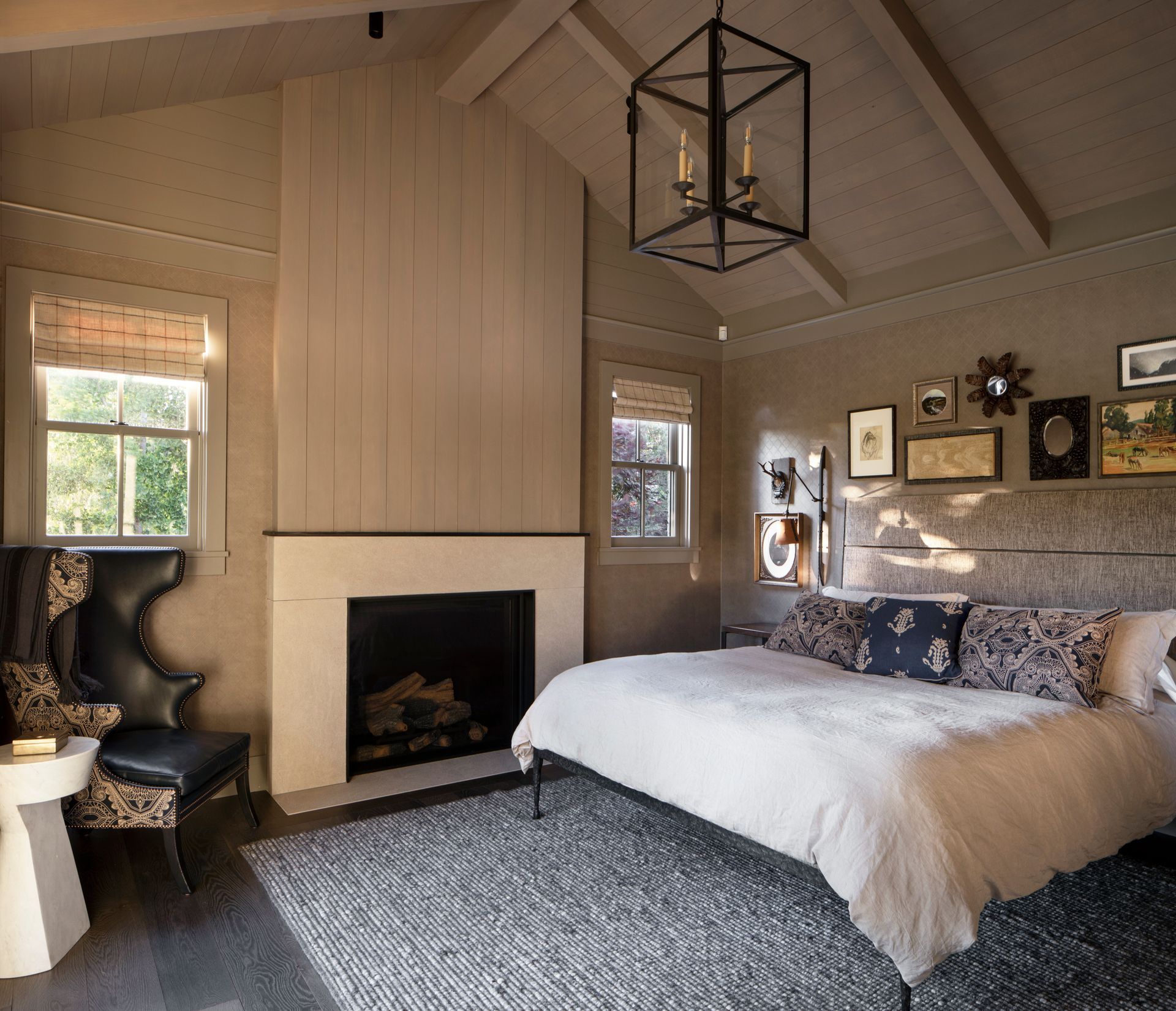 Cozy bedroom with fireplace built by Nunley Custom Homes in Greenville, SC.