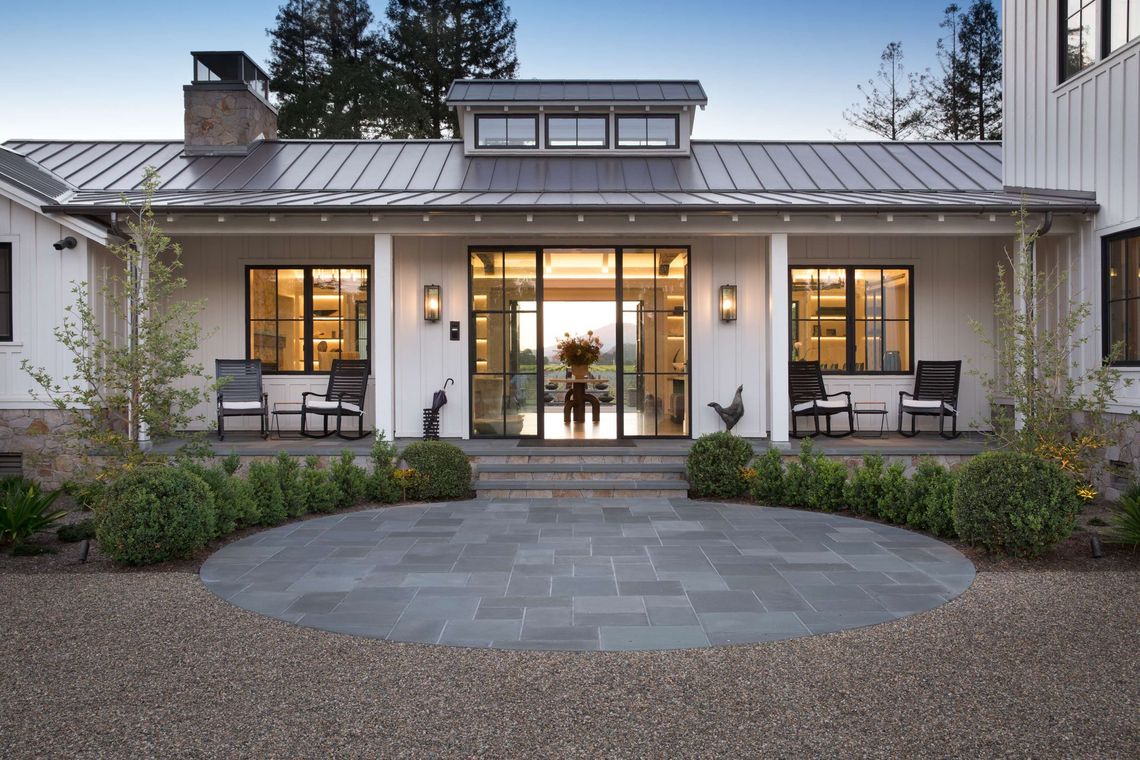 Farmhouse with porch built by Nunley Custom Homes in Greenville, SC.