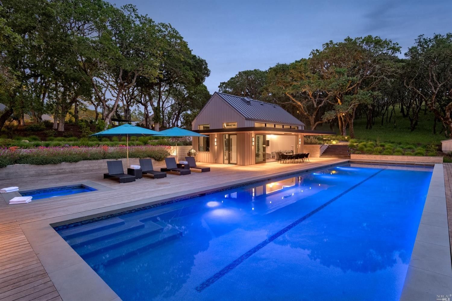 Pool with a pool house built by Nunley Custom Homes in Greenville, SC.