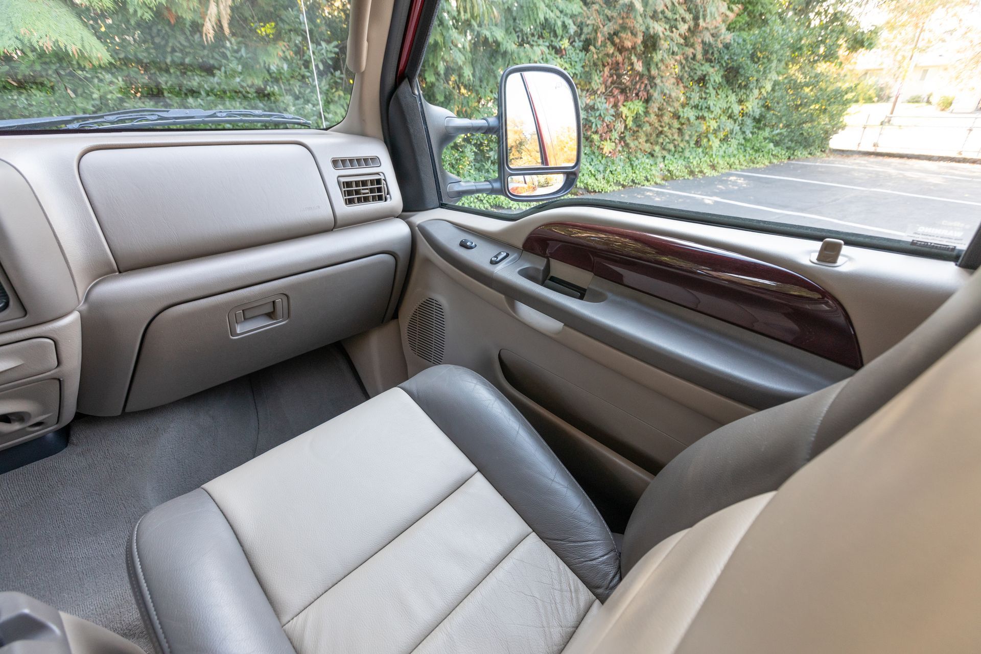 Front passenger beige leather seats, interior of truck. Front passenger beige leather seats, interior of truck.