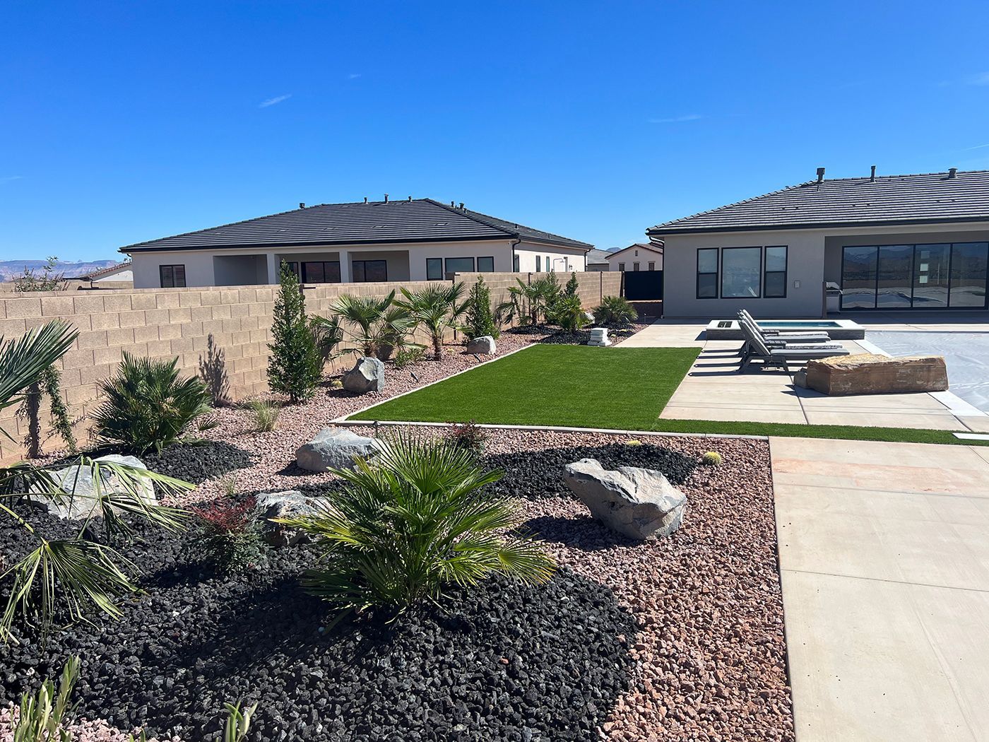 A large house with a large lawn in front of it