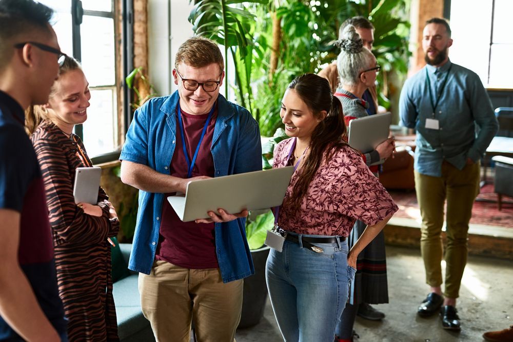 Group of People Looking at a Laptop — Keilor East, VIC — North West Melbourne Family Respite