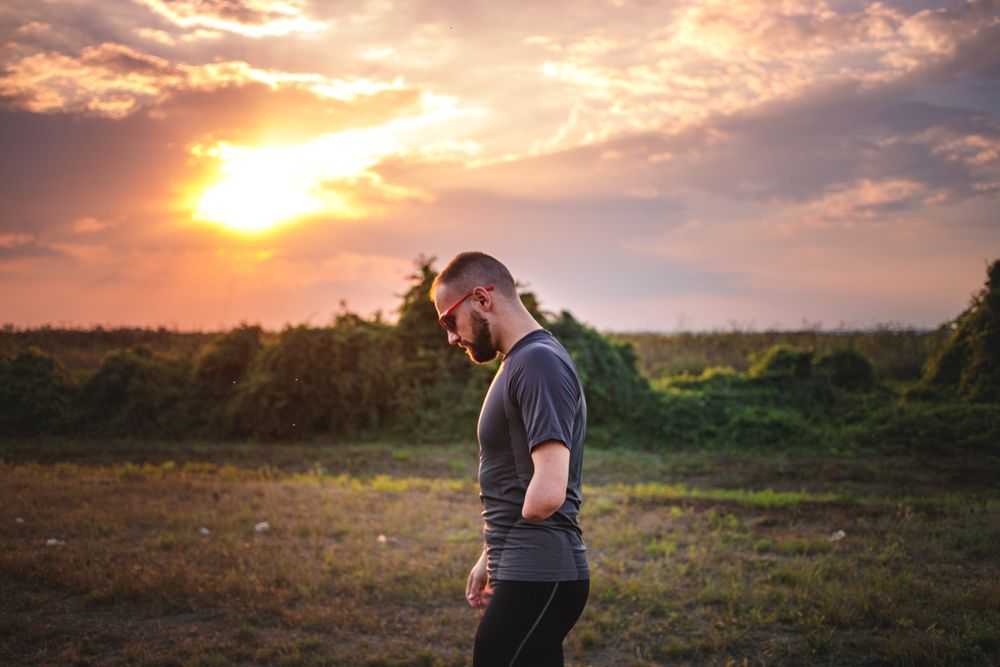 A Man Standing in a Field — Keilor East, VIC — North West Melbourne Family Respite