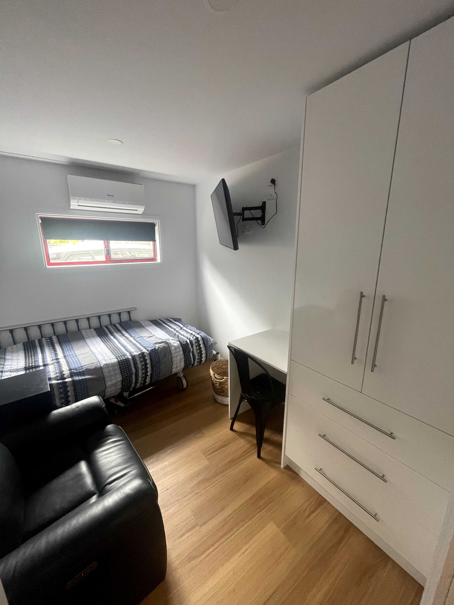 Bedroom with Chairs and TV — Keilor East, VIC — North West Melbourne Family Respite