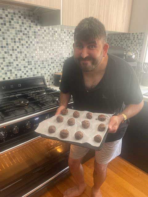 Man Holding Tray of Cookies — Keilor East, VIC — North West Melbourne Family Respite