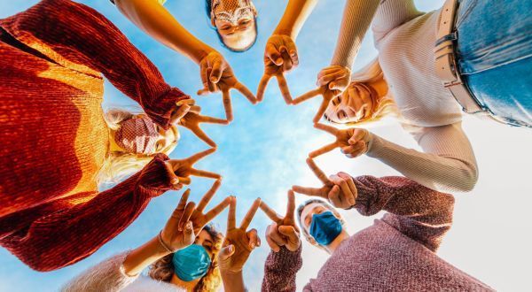 Group of People Holding Hands in a Circle — Keilor East, VIC — North West Melbourne Family Respite