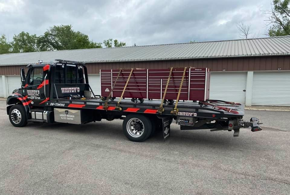 Black Car Towing — Crystal Lake, IL — Whitey's Towing Black Car Towing — Crystal Lake, IL — Whitey's Towing