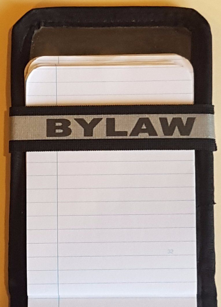 A Notebands™ for your Duty Notebook with bylaw written on it