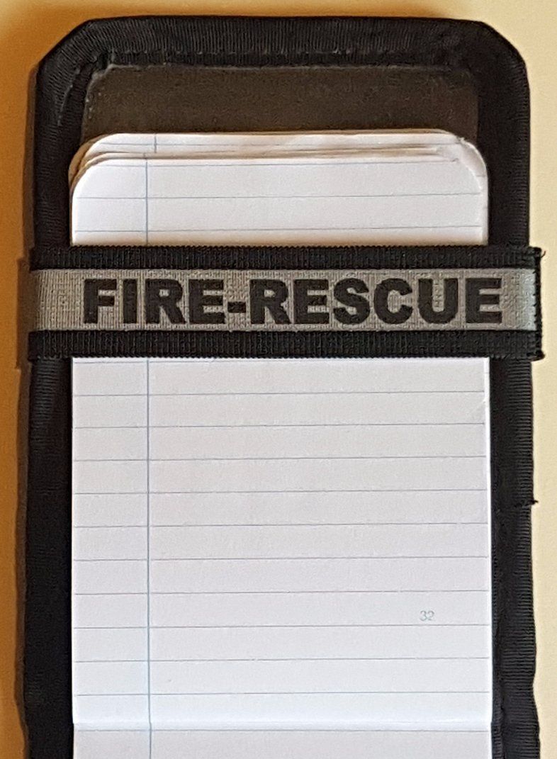 A Notebands™ for your Duty Notebook with the word fire rescue on it