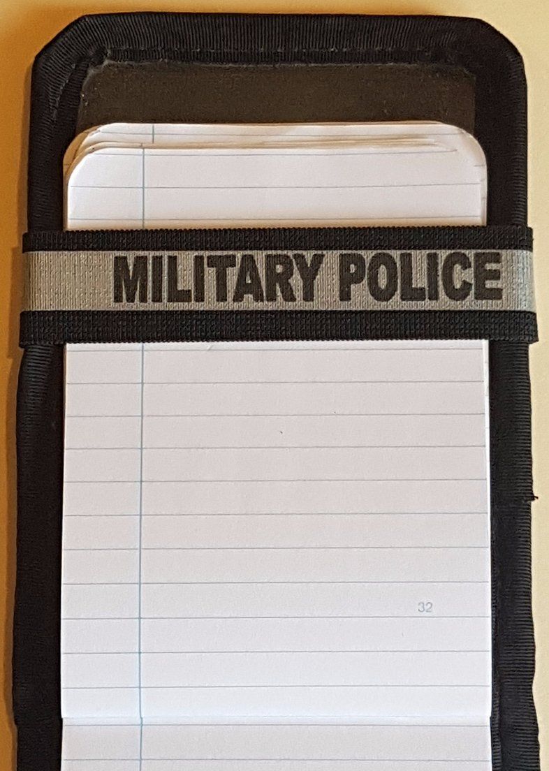 A Notebands™ for your Duty Notebook with the word military police on it