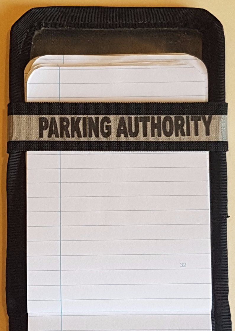 A Notebands™ for your Duty Notebook with the word parking authority on it