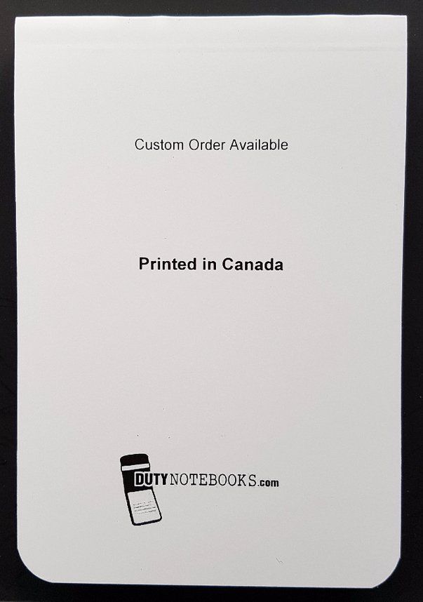 A white notebook that is printed in canada