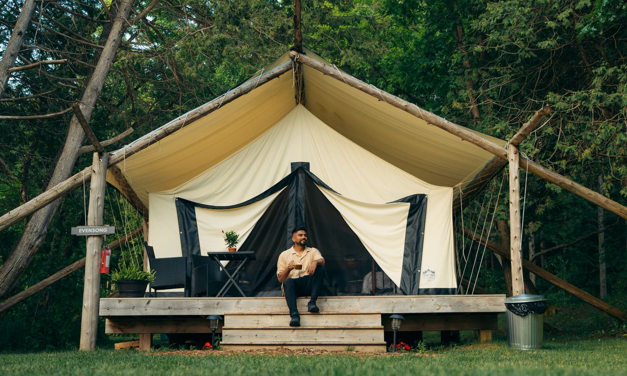 Sitting outside a luxurious glamping tent at Whispering Springs