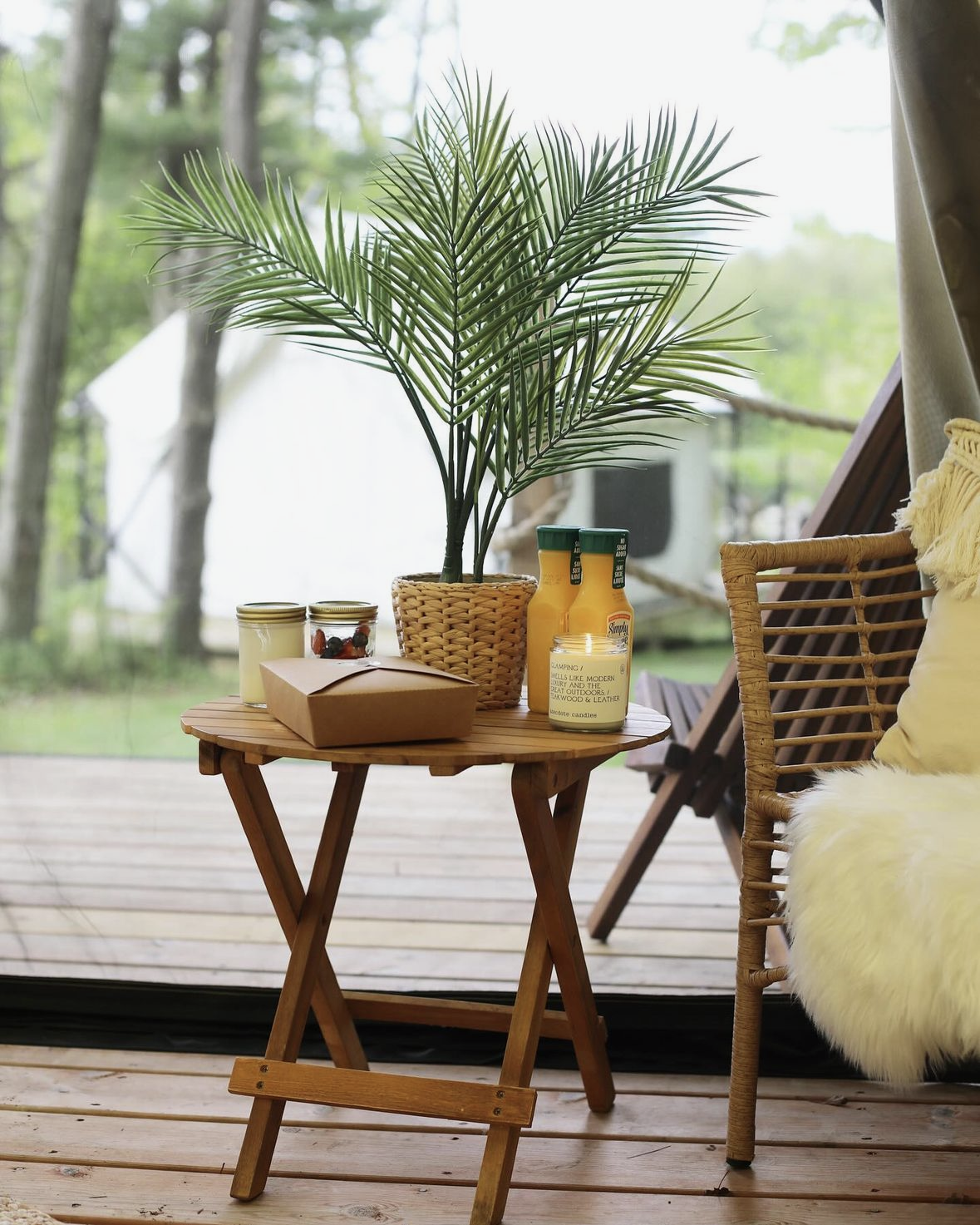A bride pours a drink during the elopement celebration