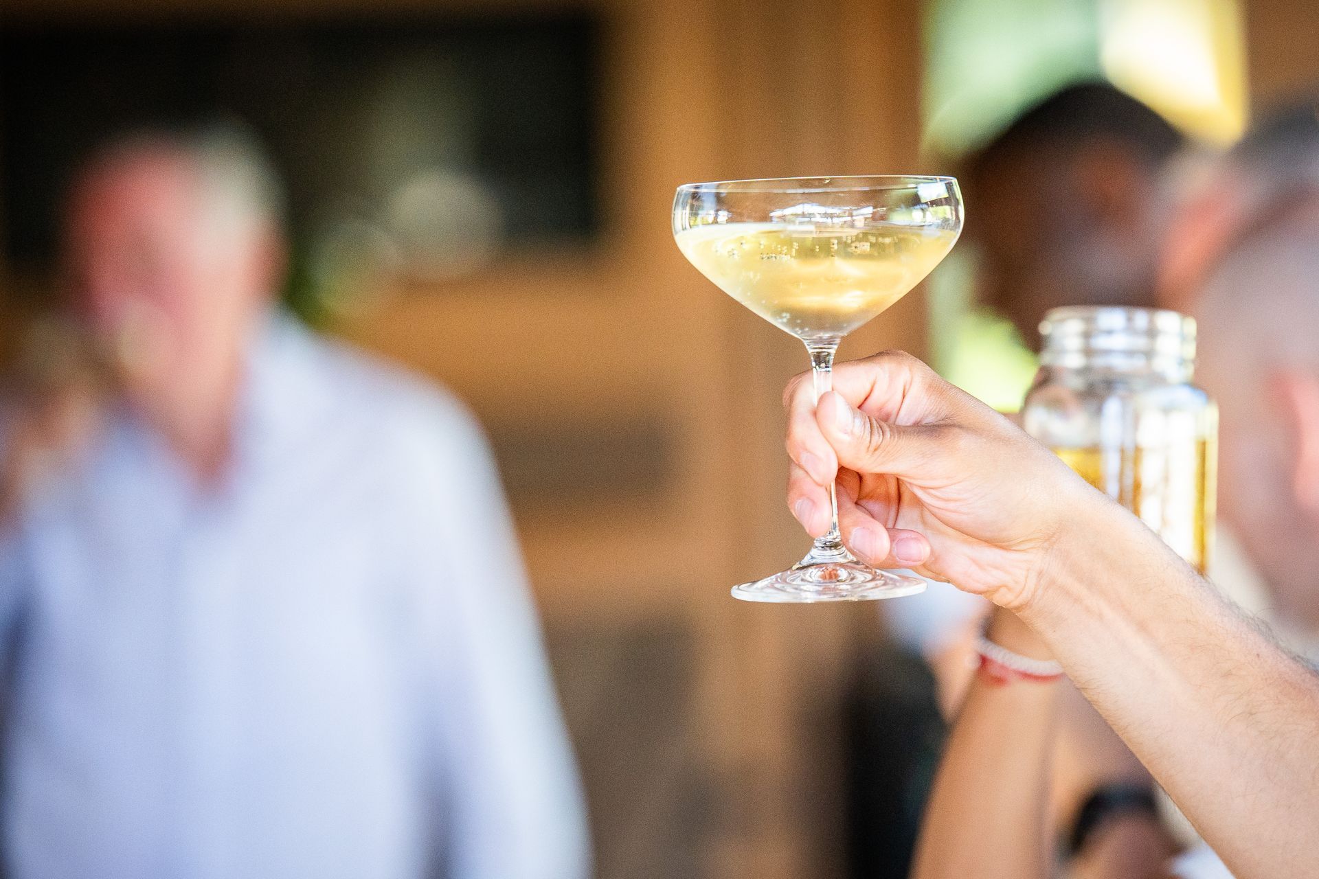 Drinking a cocktail at weddings at Whispering Springs.