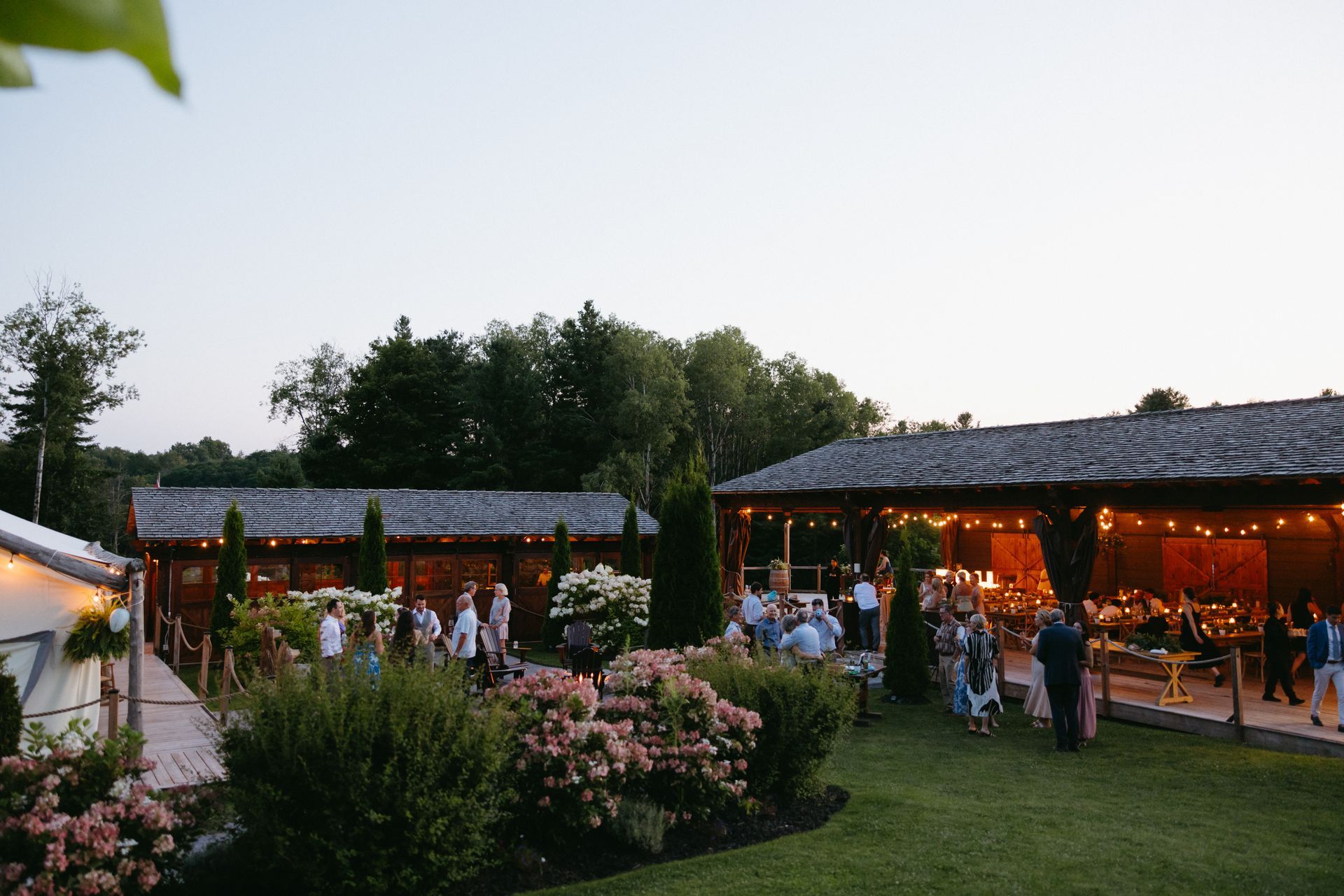 Wedding guests gather for drinks and dancing at Whispering Springs