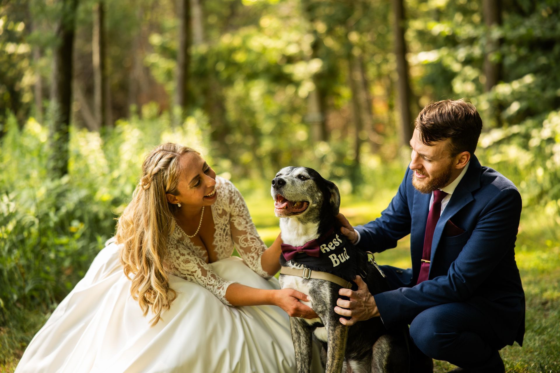 Bride and groom with pet dog at Whispering Springs wedding