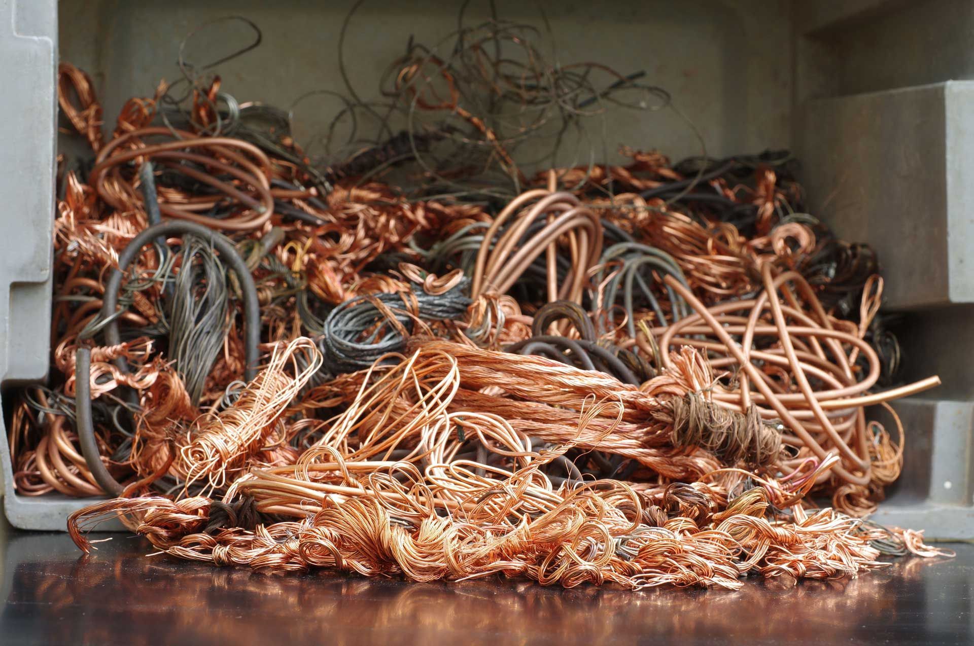 Copper wires in recycling facility, symbolizing ferrous metal recycling solutions.