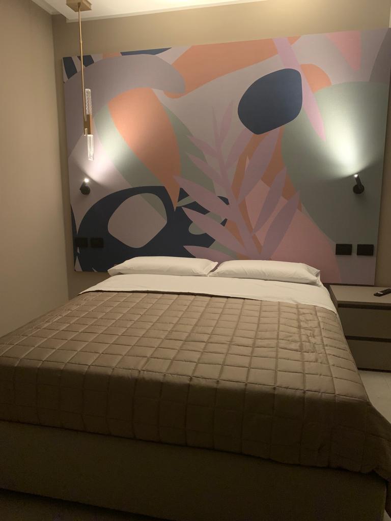 camera singola con letto matrimoniale