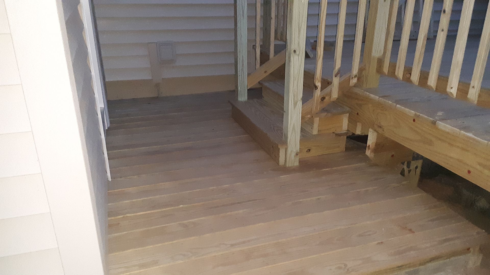 A wooden deck installation​ in Glastonbury CT in progress - Exteriors of CT hard at work