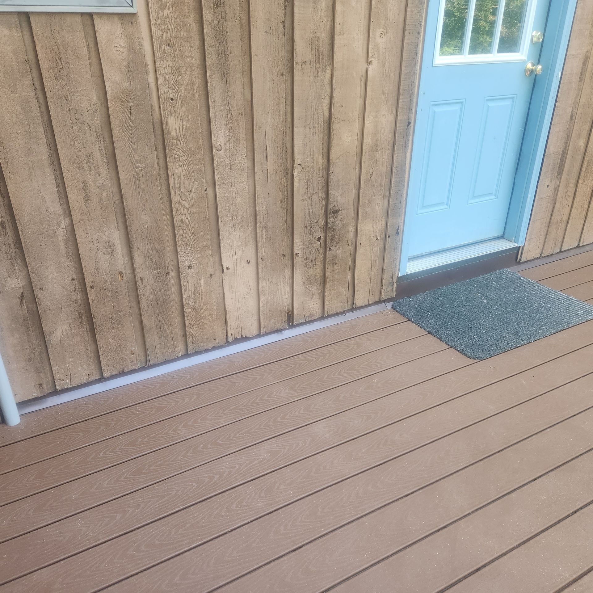 A finished deck construction and installation​ in Glastonbury CT by Exteriors of CT