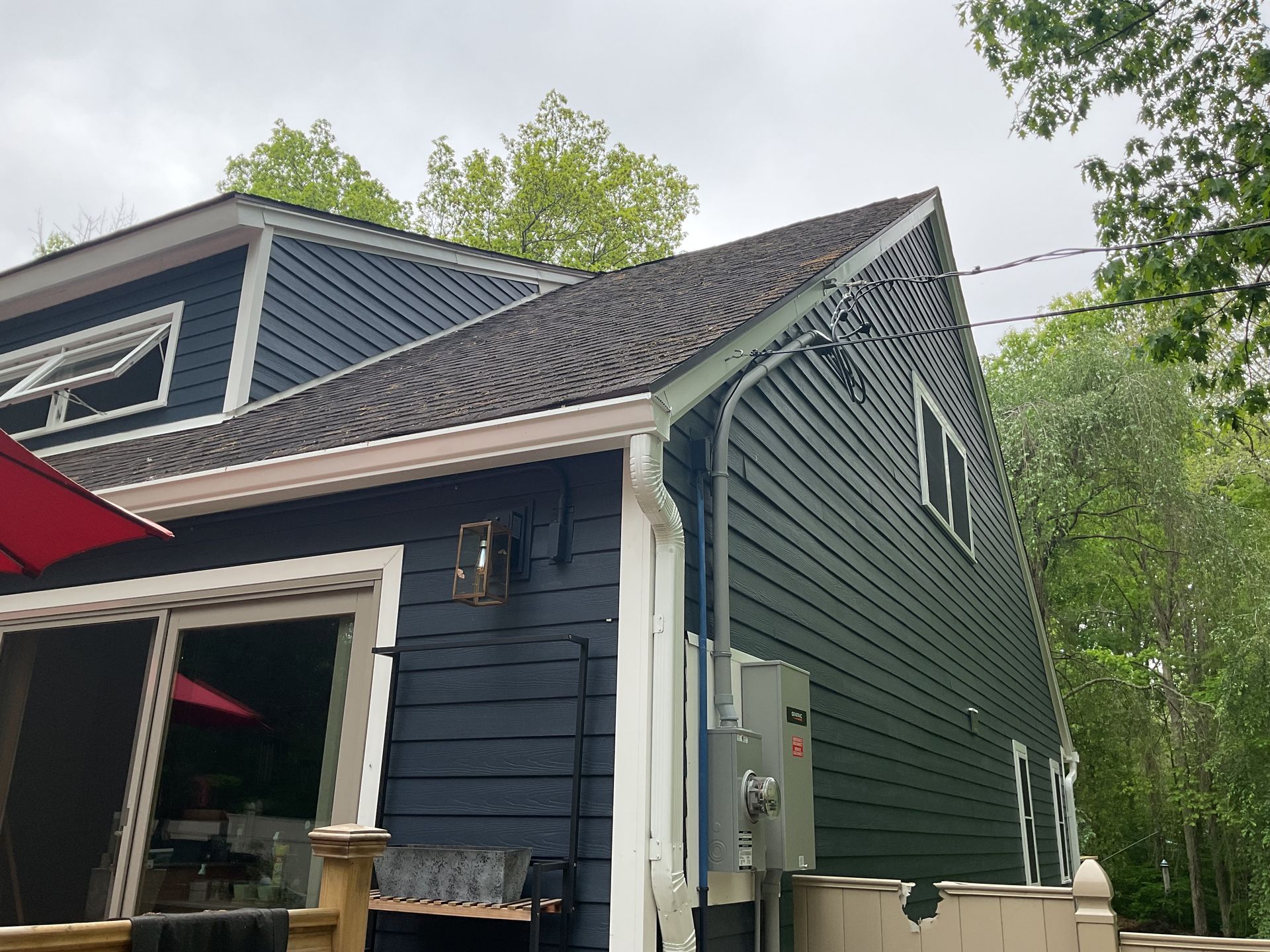 A new siding installation in Glastonbury, CT in action - Exteriors of CT hard at work