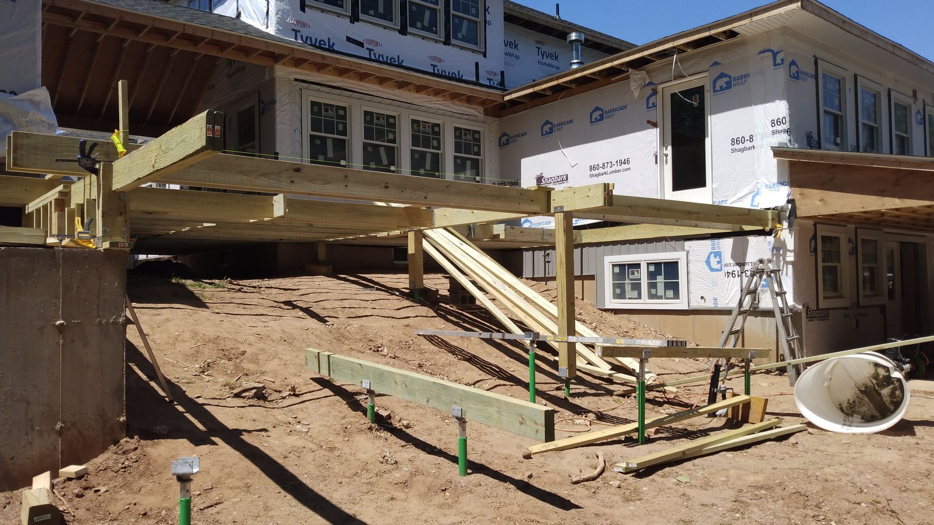 A wooden deck installation​ in Glastonbury CT in progress - Exteriors of CT hard at work