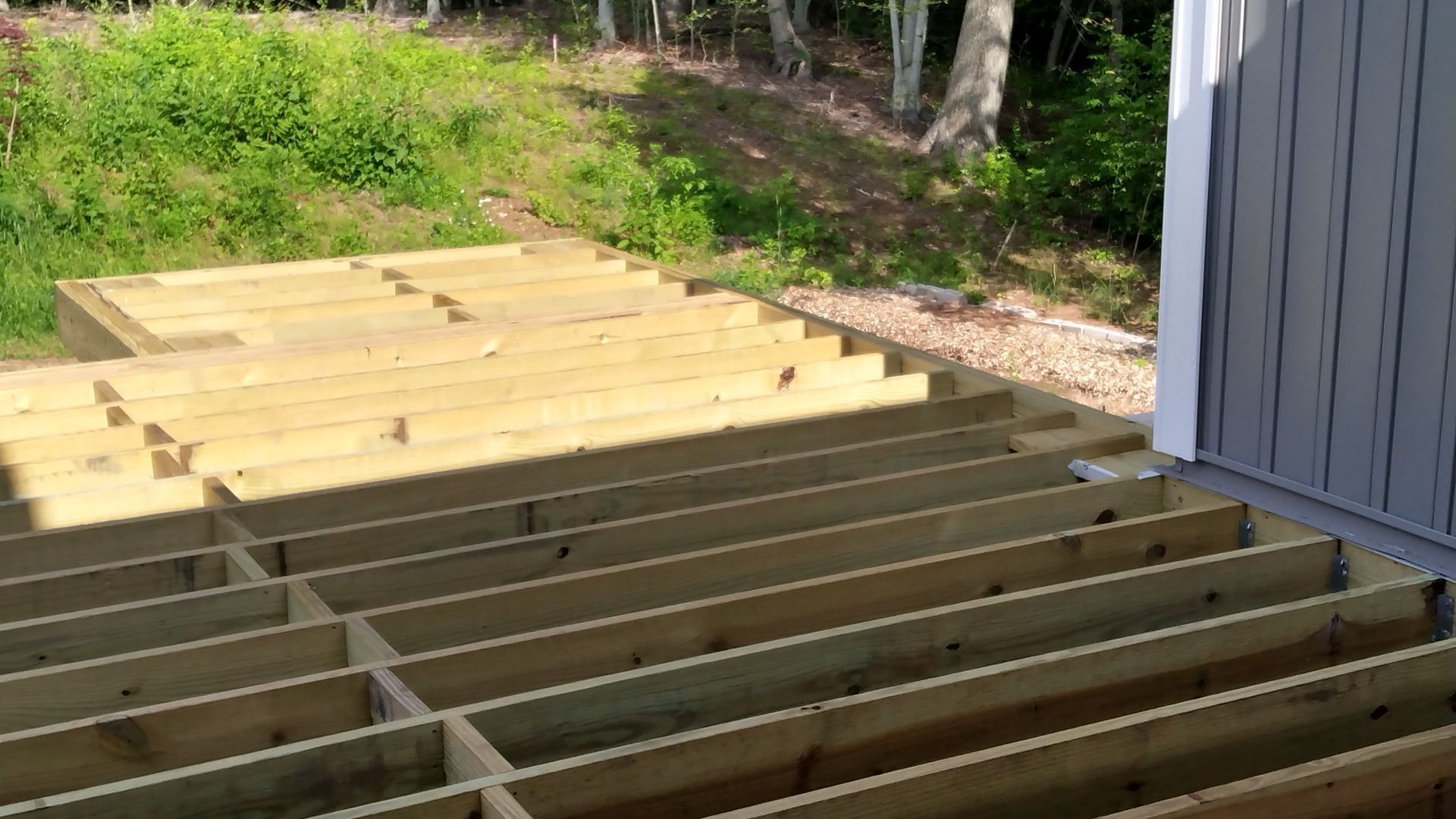 A wooden deck installation​ in Glastonbury CT in progress - Exteriors of CT hard at work