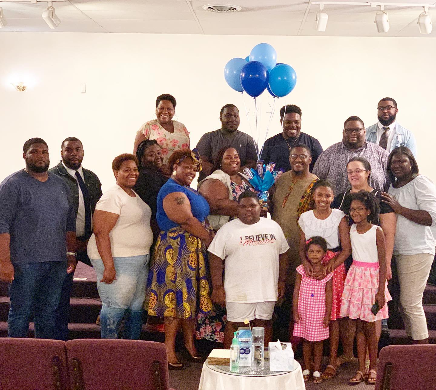 church members standing in church