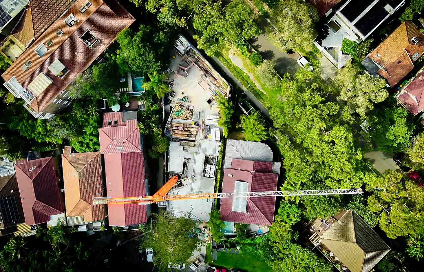Aerial photo looking over a construction site with crane Professional Drone Imagery Illawarra Photographer Heather James