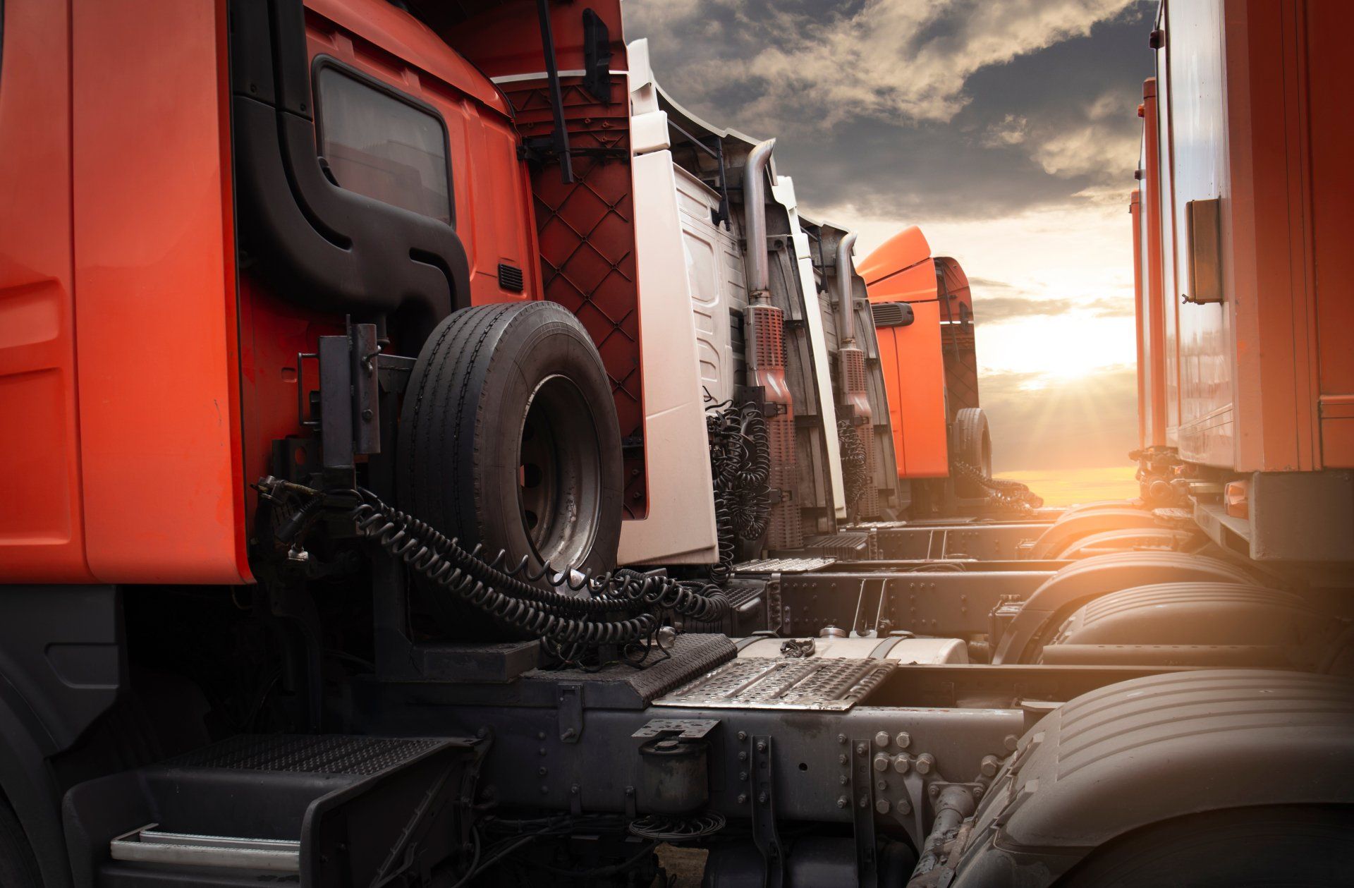 Semi-truck trailer parking at sunset sky. tractor truck. Industry freight truck transportation.