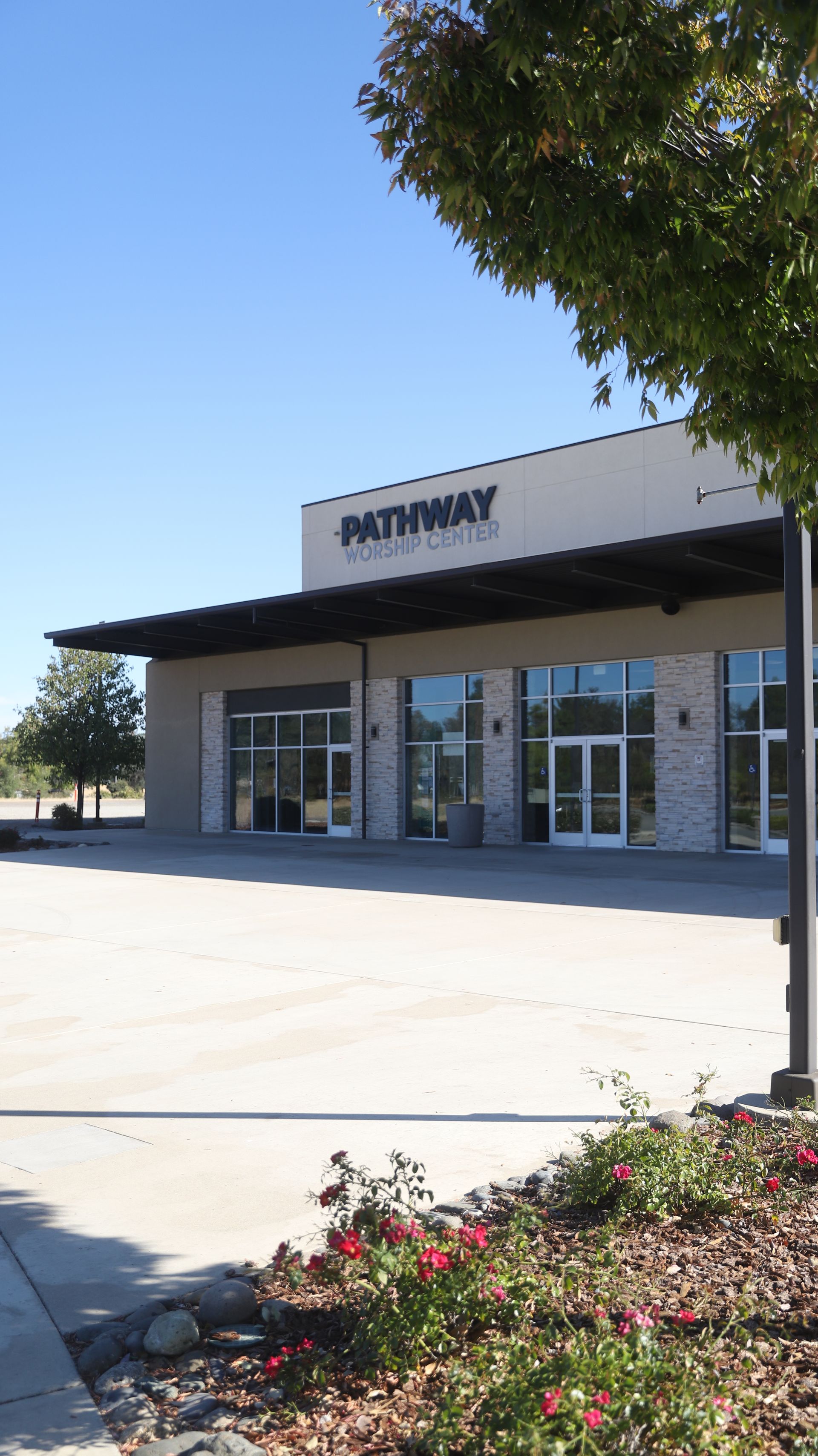 A white building with the word Pathway on it