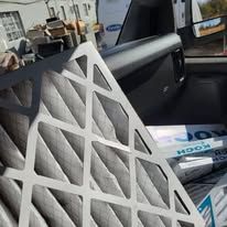 A close up of a filter in a car.