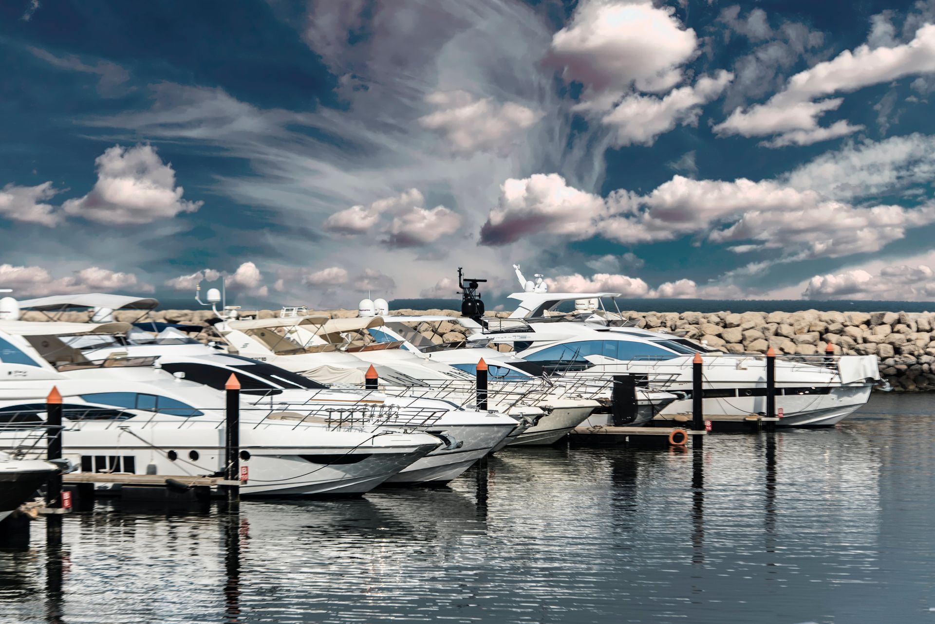 yachts parked at a marina image by frans van heerden