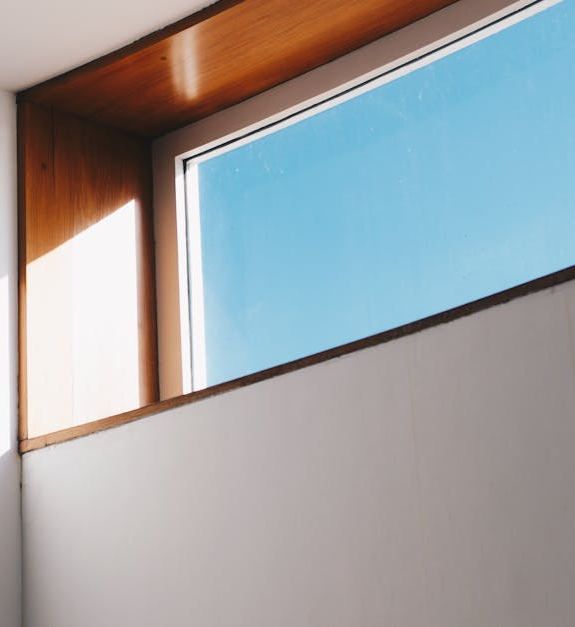 A window with a blue sky behind it