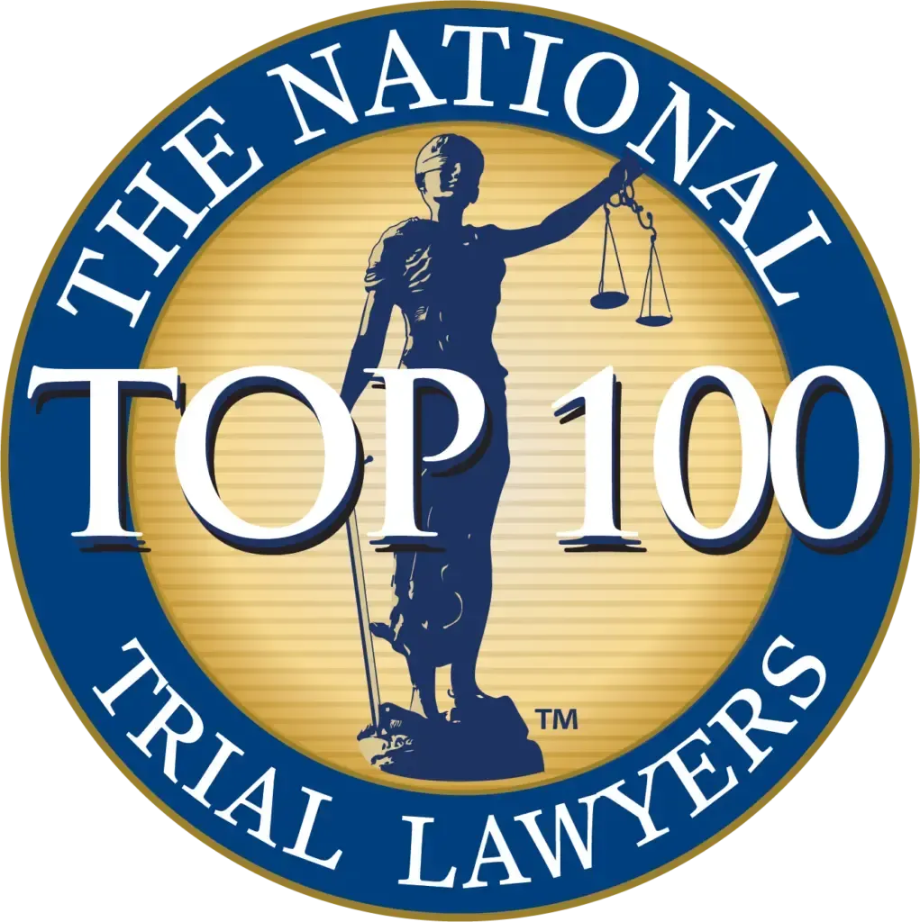 The National Trial Lawyers Top 100 logo: Lady Justice silhouette, scales, and sword, in a blue and gold circular design.