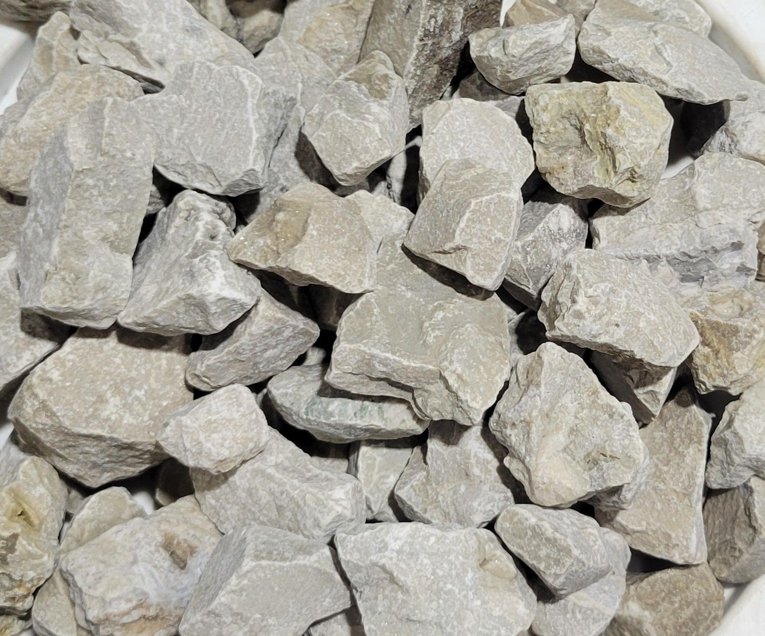 A pile of rocks on a white plate