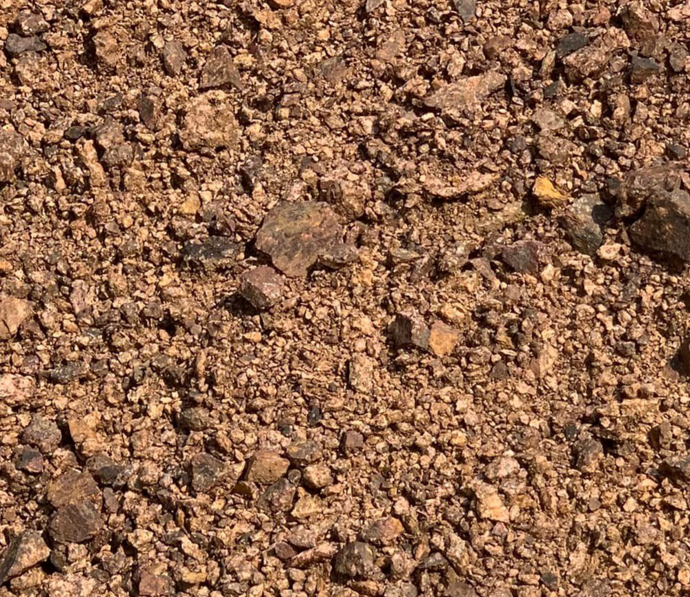 A light box that says `` coming soon '' next to a bowl of popcorn.