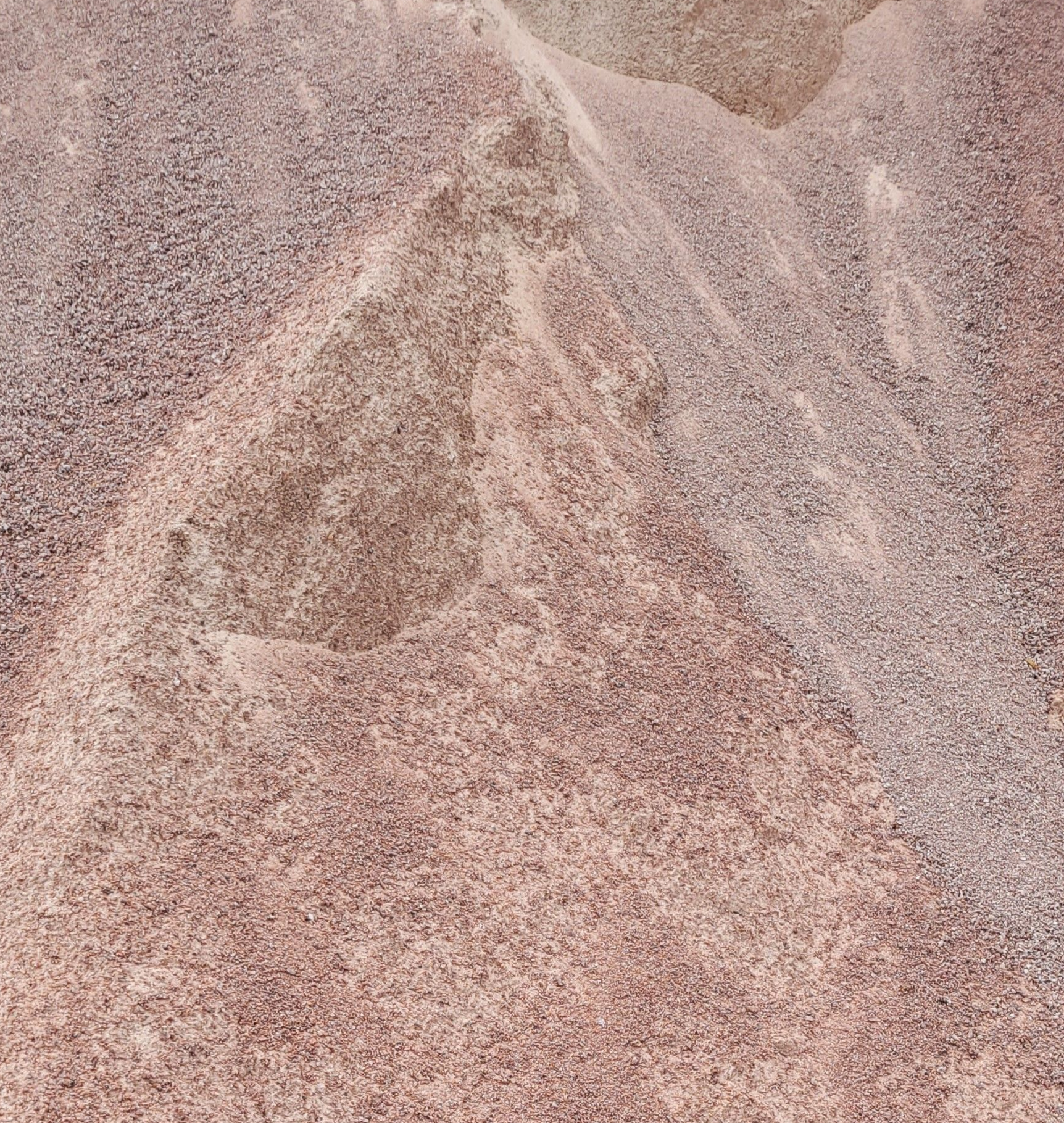 A pile of gravel is sitting on top of a white plate.