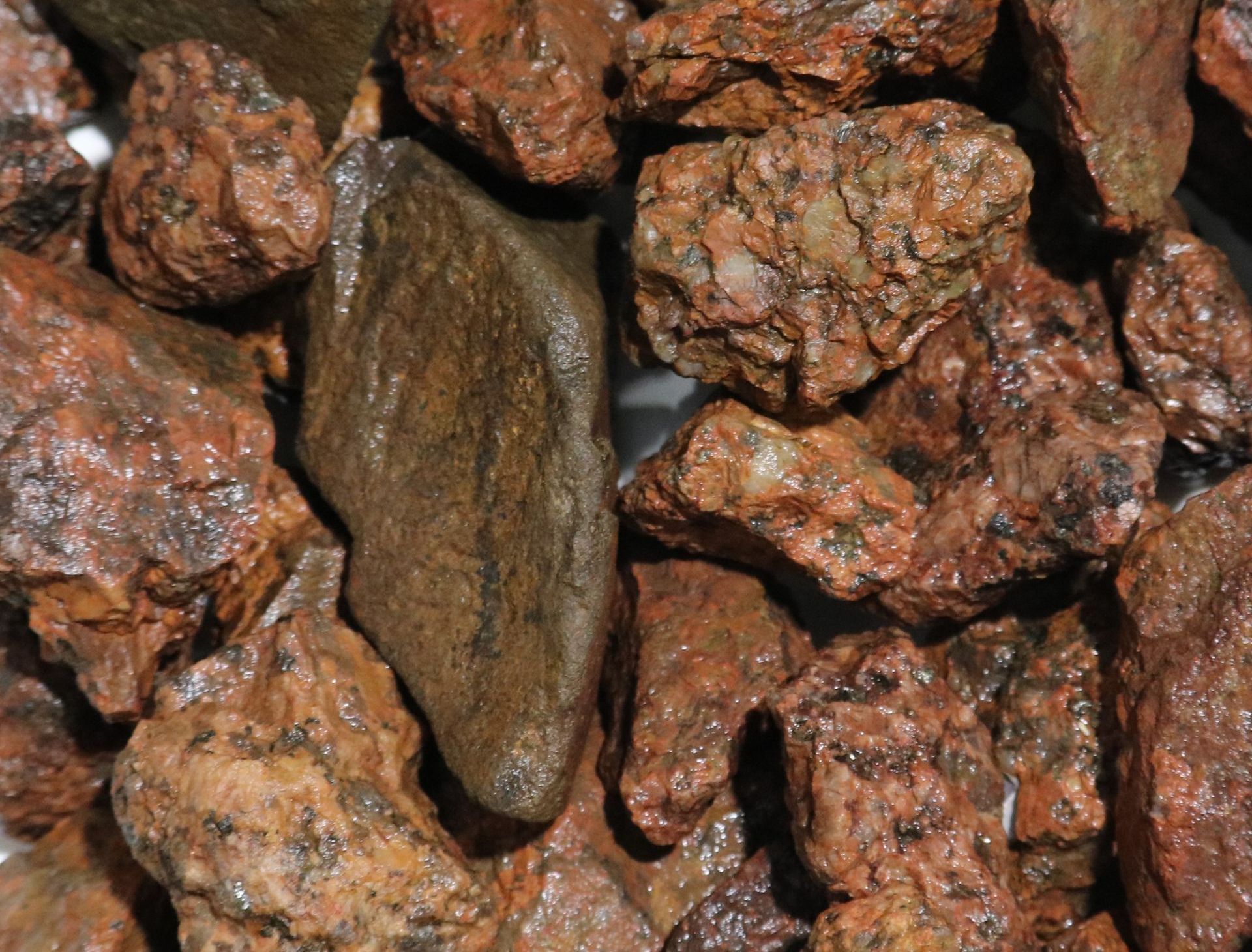 A pile of rocks is sitting on top of each other on a table.
