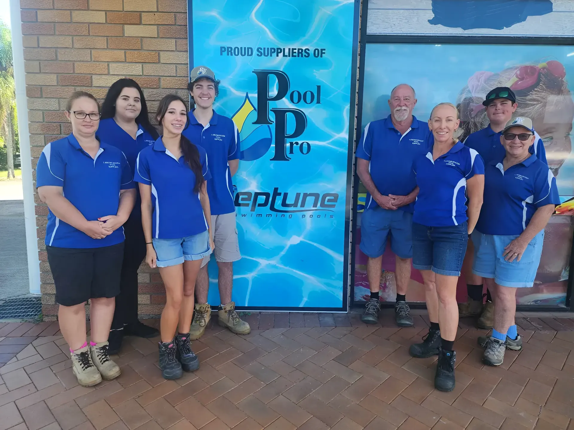 Group of People in Blue Shirts — Landsborough Pool Supplies & Service in Landsborough, QLD