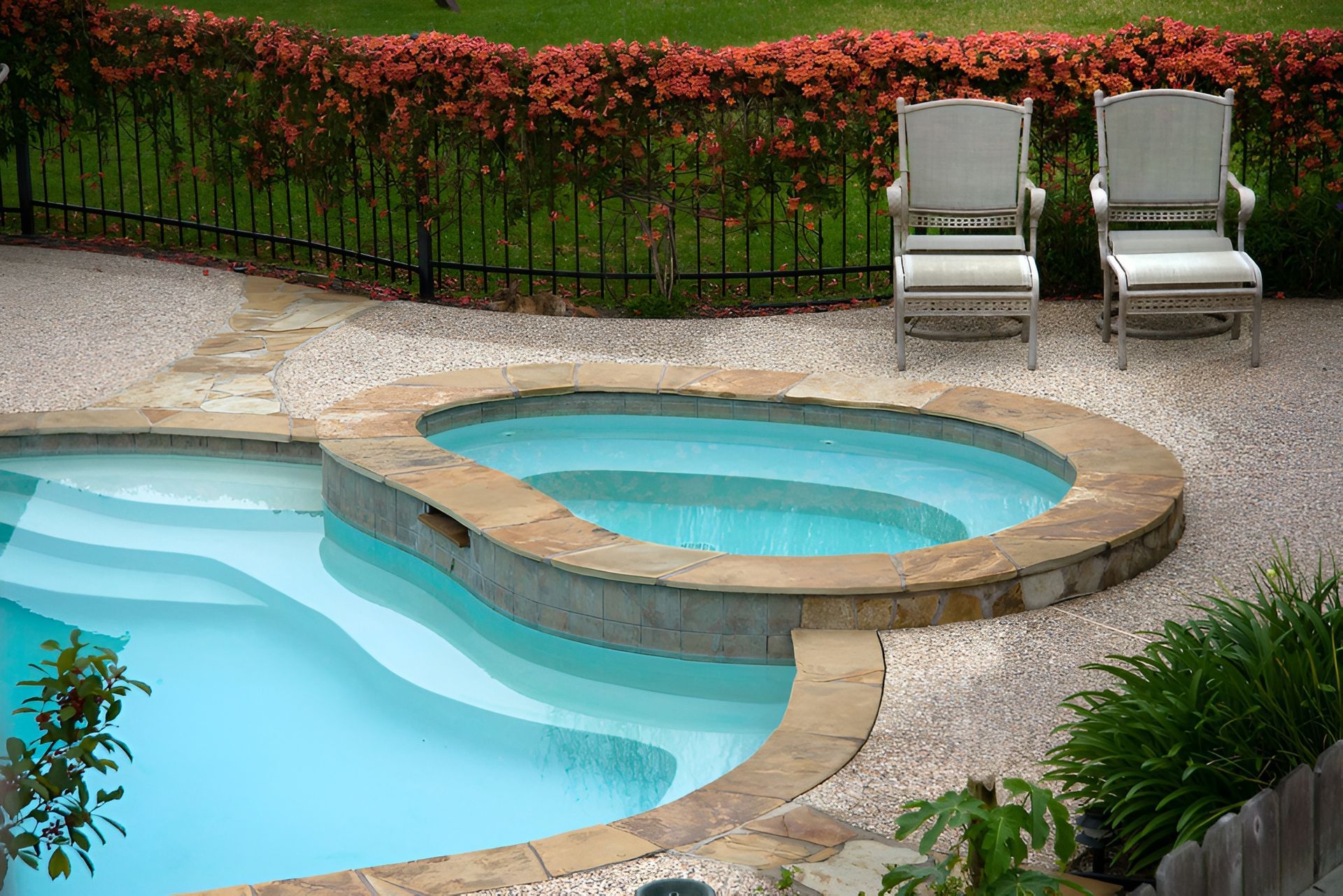 Pool and Spa With Lounge Chairs — Landsborough Pool Supplies & Service in Beerwah, QLD
