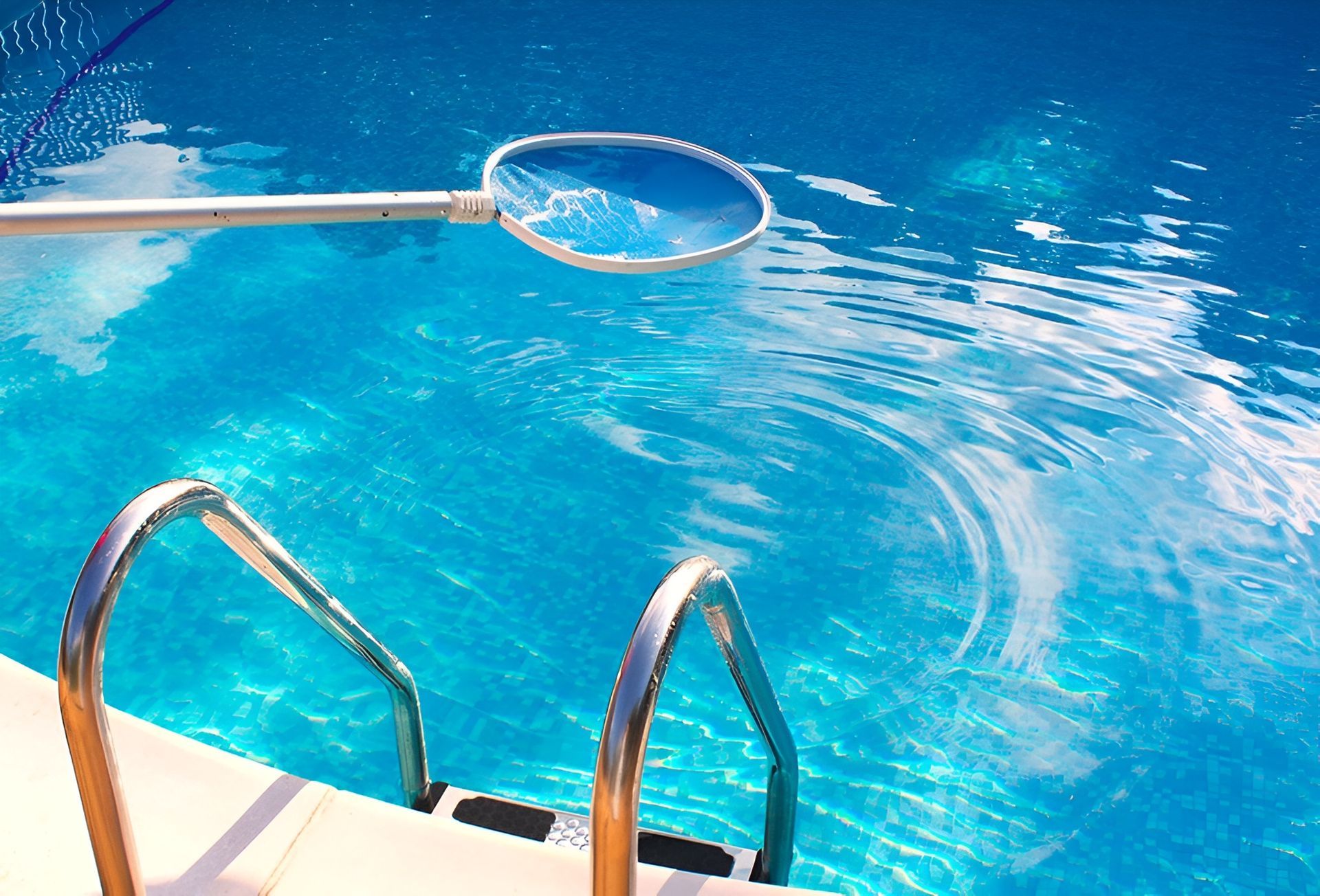 Pool Being Cleaned With a Net — Landsborough Pool Supplies & Service in Sunshine Coast, QLD