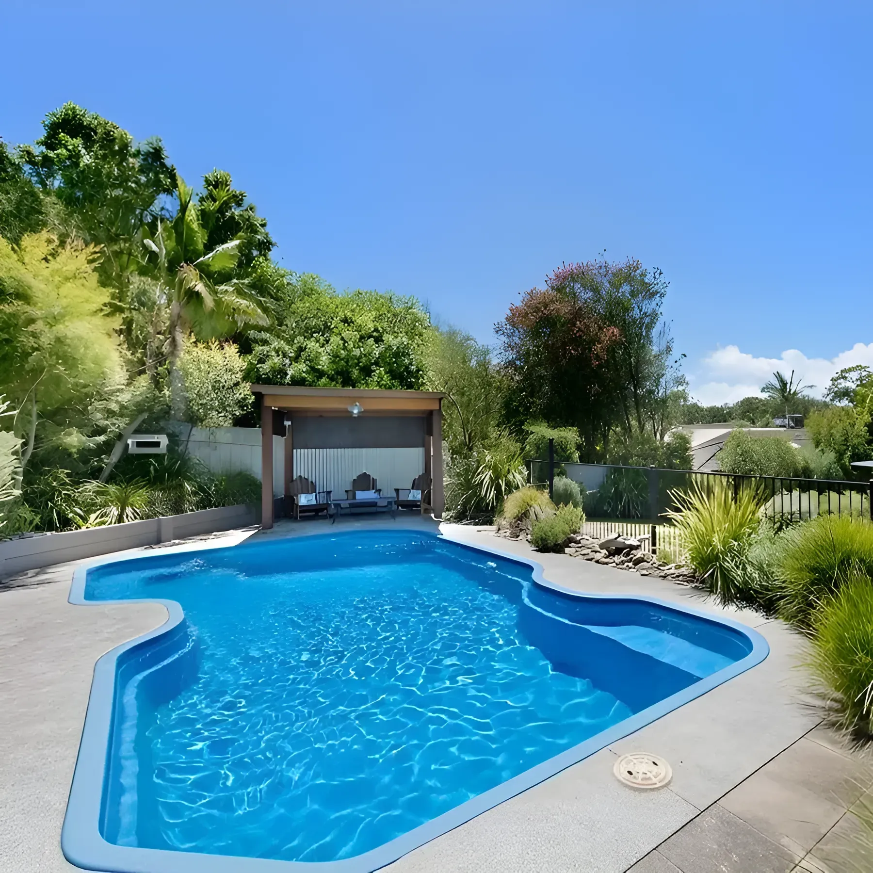 Swimming Pool With Blue Water — Landsborough Pool Supplies & Service in Landsborough, QLD