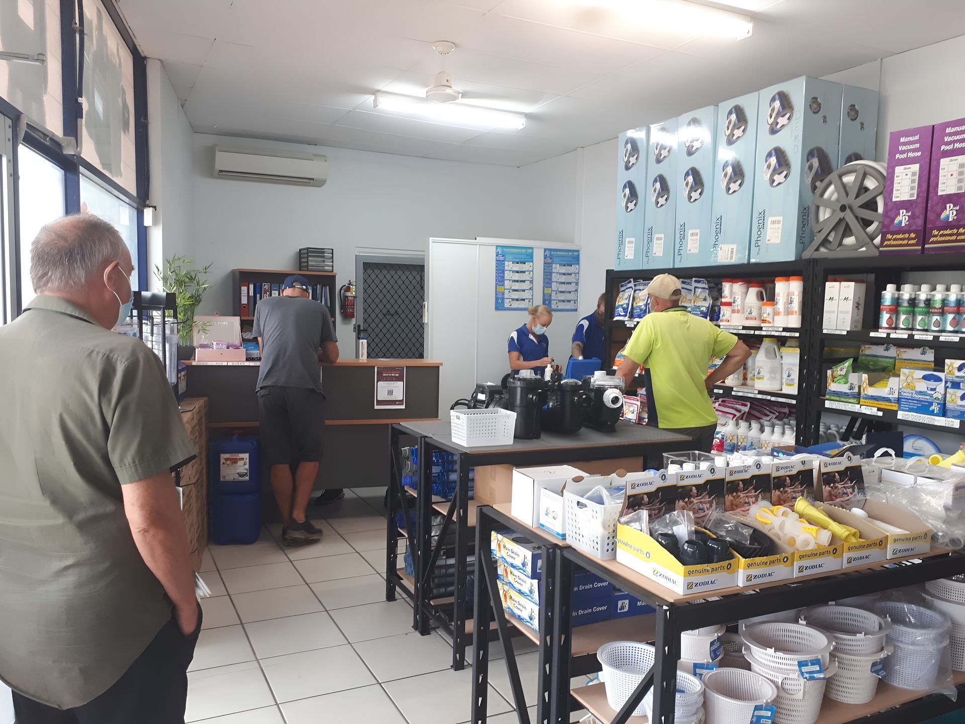 People in a Store, Looking at Items on Shelves — Landsborough Pool Supplies & Service in Caloundra, QLD