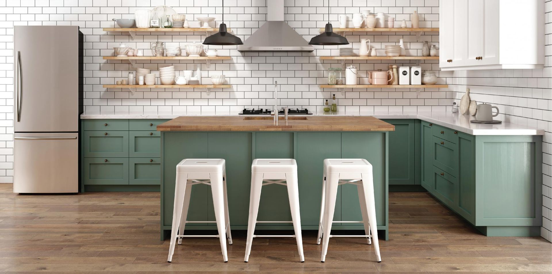 A kitchen with green cabinets , white stools , a refrigerator and a sink.