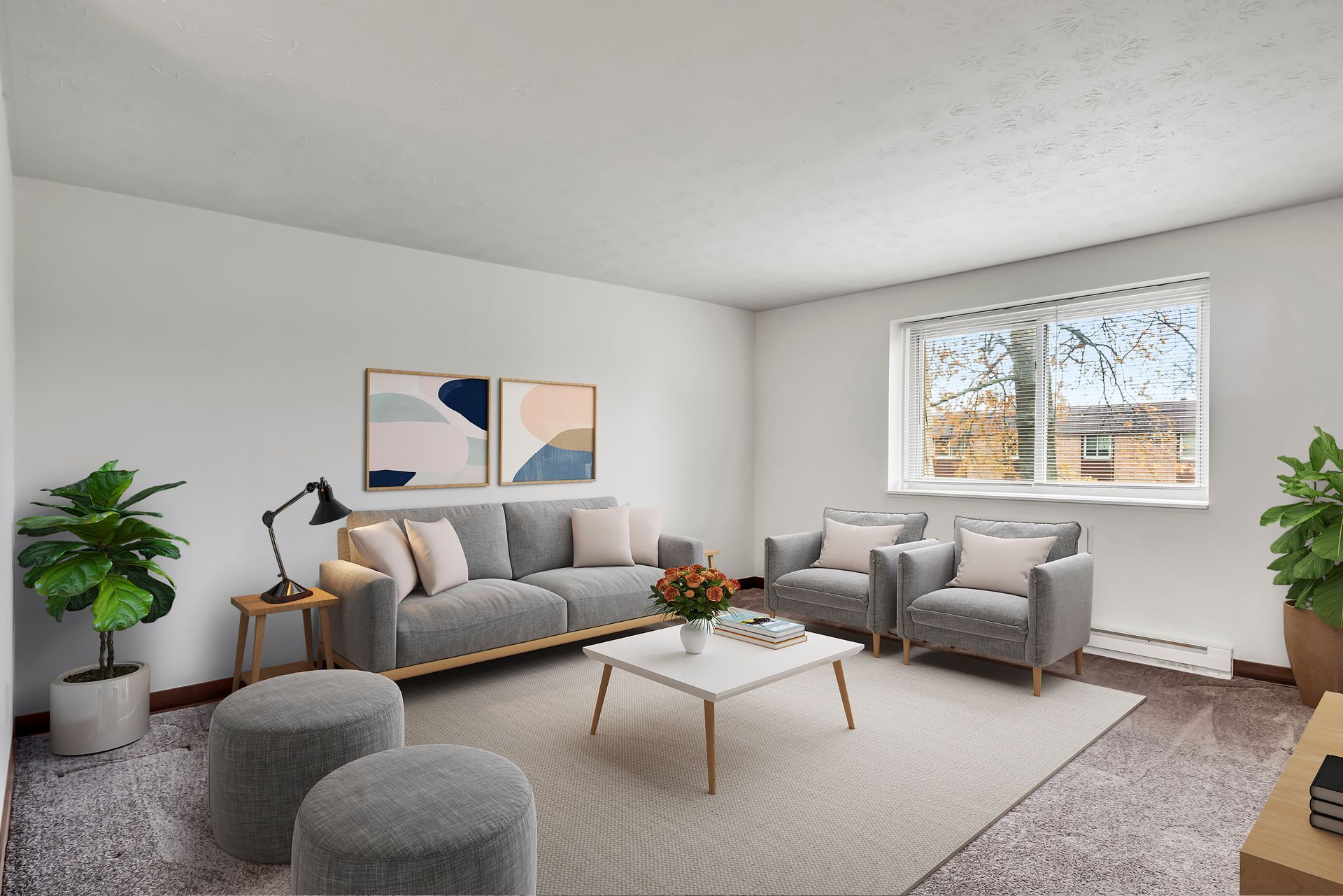 A living room with a couch , chairs , ottomans and a coffee table.