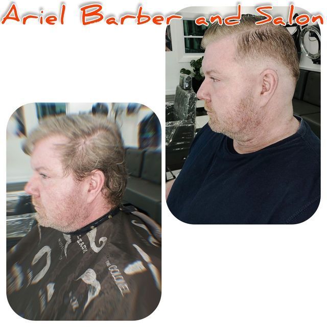 A man is getting his hair cut at ariel barber and salon