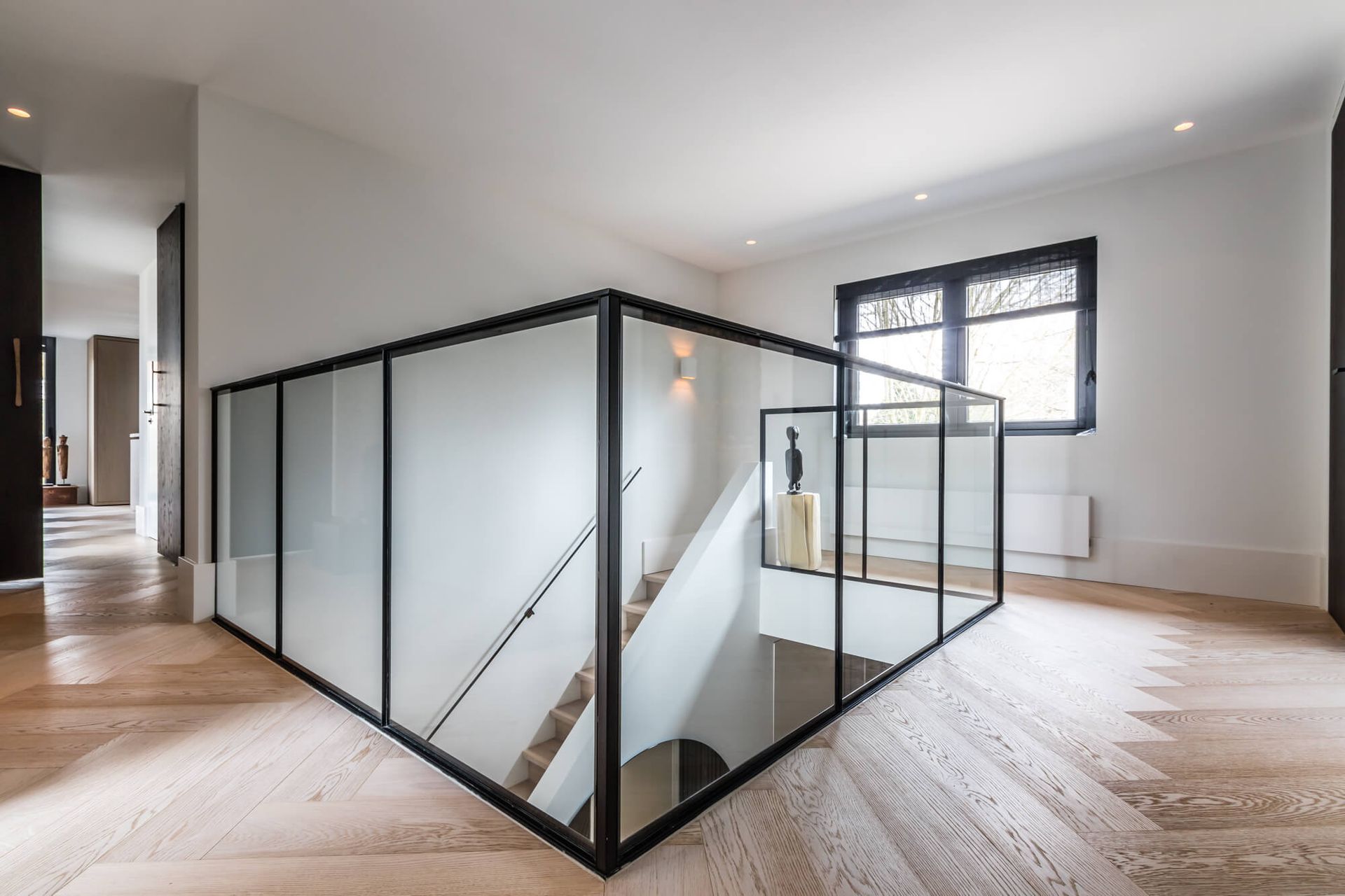 Stalen balustrade met glas rondom trapgat